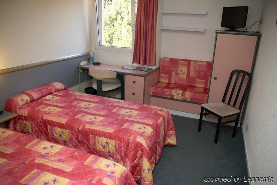 Brit Hotel Dak Hotel Avallon Room photo